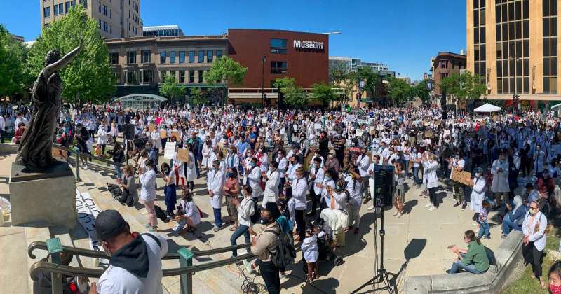 Black Lives Find Advocates in White Coats