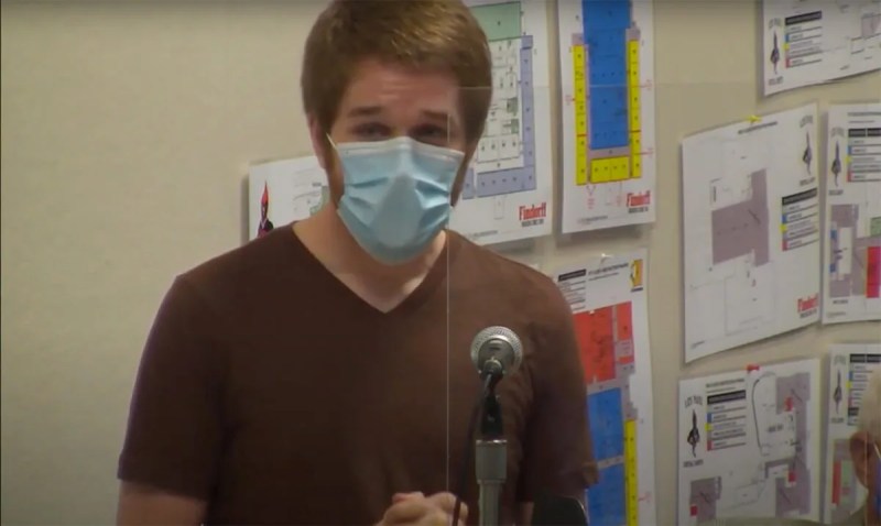 Ben Strong, a local activist, speaks last week during a Waukesha School Board meeting. After he finished speaking, an unidentified voice could be heard calling him an "asshole."