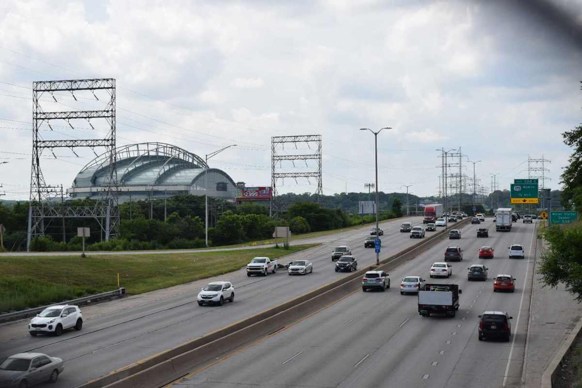 Light midday traffic on the I-94 East-West corridor, looking west with Miller Park to the south.