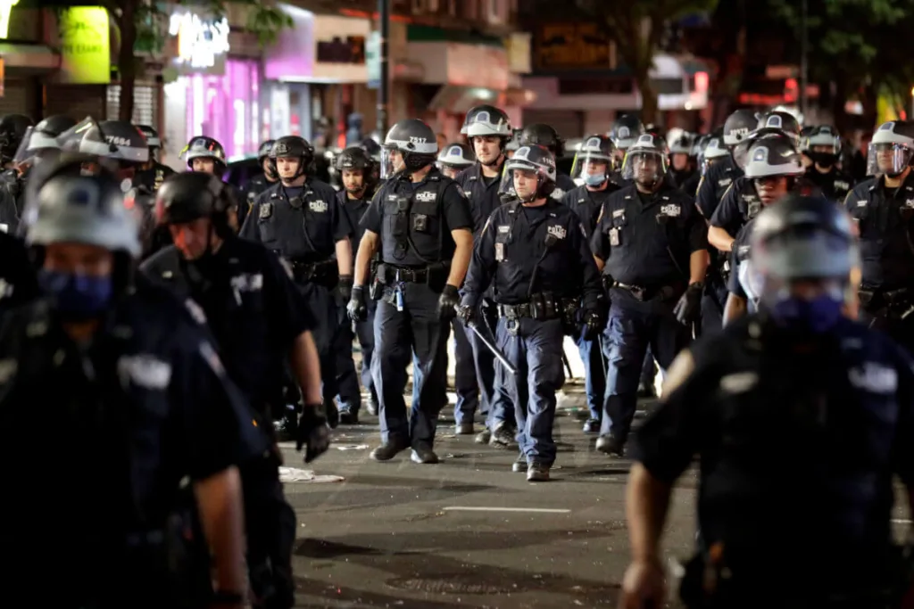 Police have deployed a variety of violent tactics against protestors since May. (AP Photo/Seth Wenig)