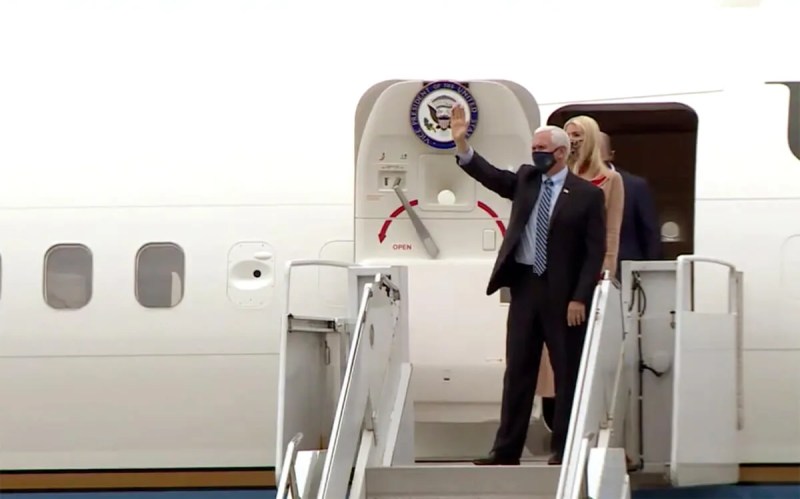 Vice President Mike Pence exits Air Force Two on Thursday in Eau Claire.