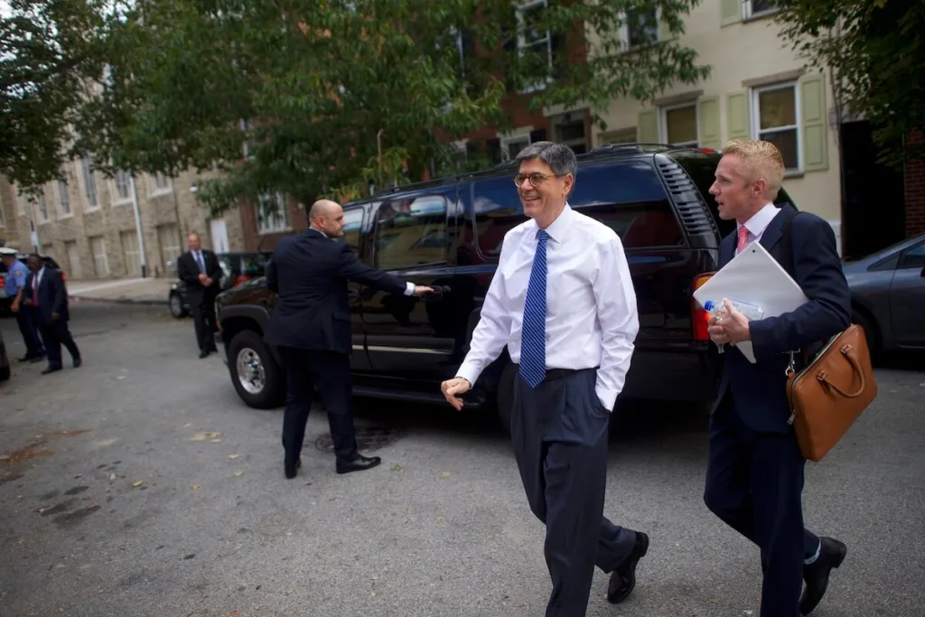 Chris Van Es with then-Treasury Secy Jack Lew in 2016.