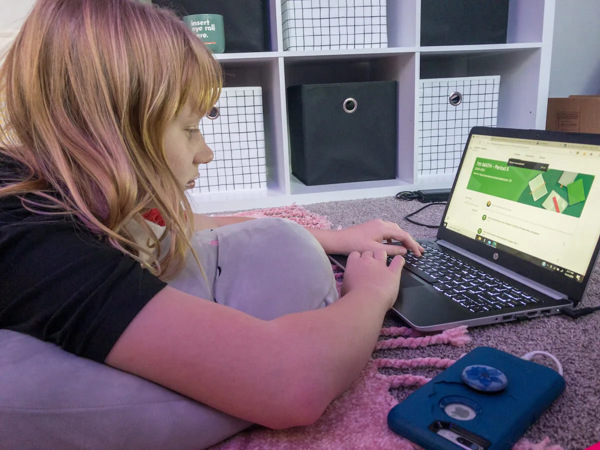 Sara Shelton, 12, of Green Bay works on her schoolwork remotely.