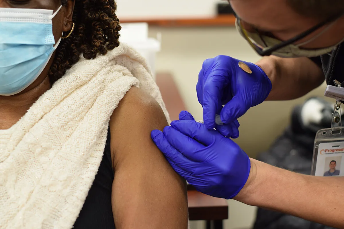 woman receiving vaccine