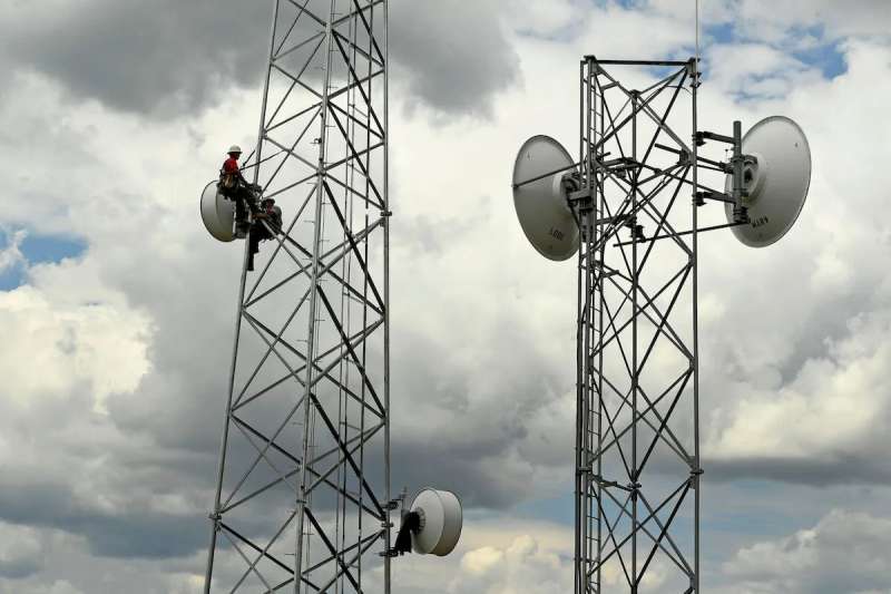 Workers on internet towers