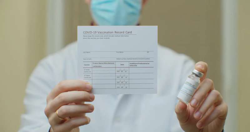 Shutterstock image of vaccination card