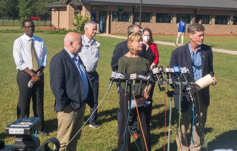 Democratic state and federal lawmakers speak to reporters Tuesday after visiting Afghan refugees at Fort McCoy.