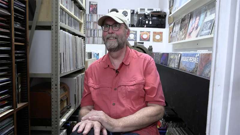 Steve Cotherman is the manager of the Washburn Cultural Center and proud curator of the Vinyl Vault. He is happy to send anyone home with a stack of classics. (Photo by JT Cestkowski)