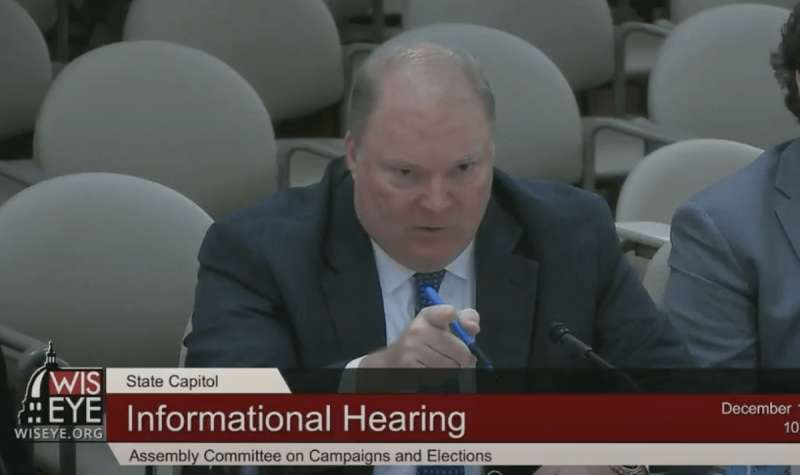 In the screen image from WisconsinEye on Dec. 1, 2021, former Wisconsin Supreme Court Justice Mike Gableman interrupts a state legislator asking questions about the nature of his 2020 election investigation created by Republican lawmakers.