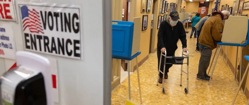 Voters take to the polls to cast their ballot for the Nov. election during early voting at Waukesha City Hall, Tuesday, Oct. 20, 2020. (Darren Hauck for The Washington Post via Getty Images)
