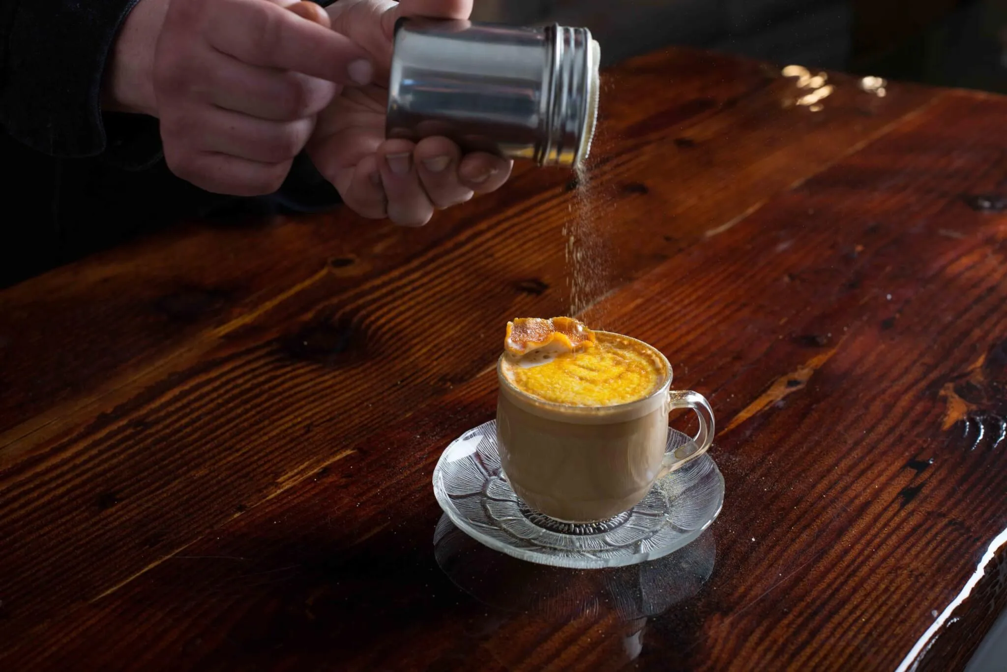 Discourse Coffee's Channel Orange drink, made with espresso, smoked and oaked vanilla, candied orange powder, and more.