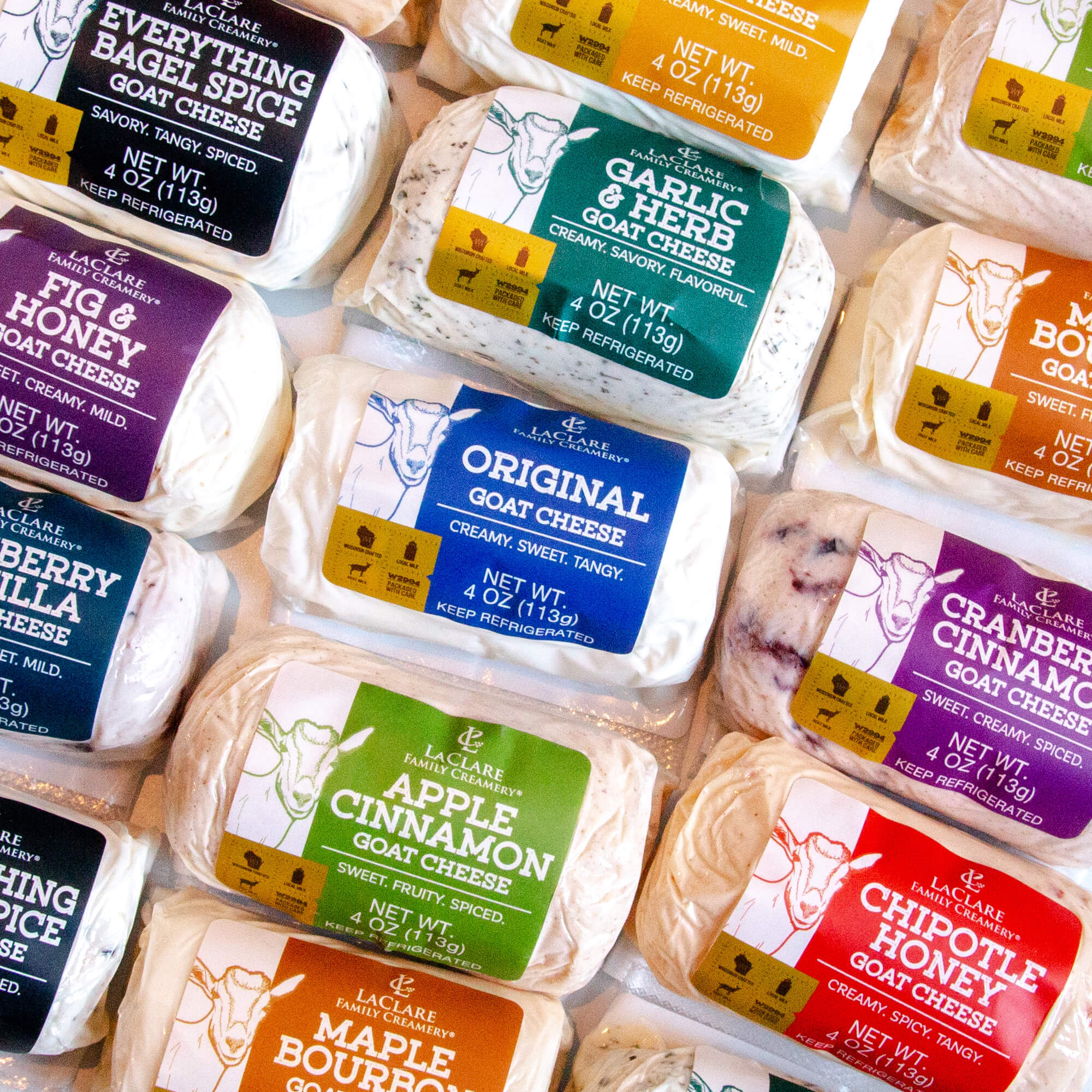 Variety of goat cheeses from LaClare Creamery, including Apple Cinnamon, Chipotle Honey, and Maple Bourbon