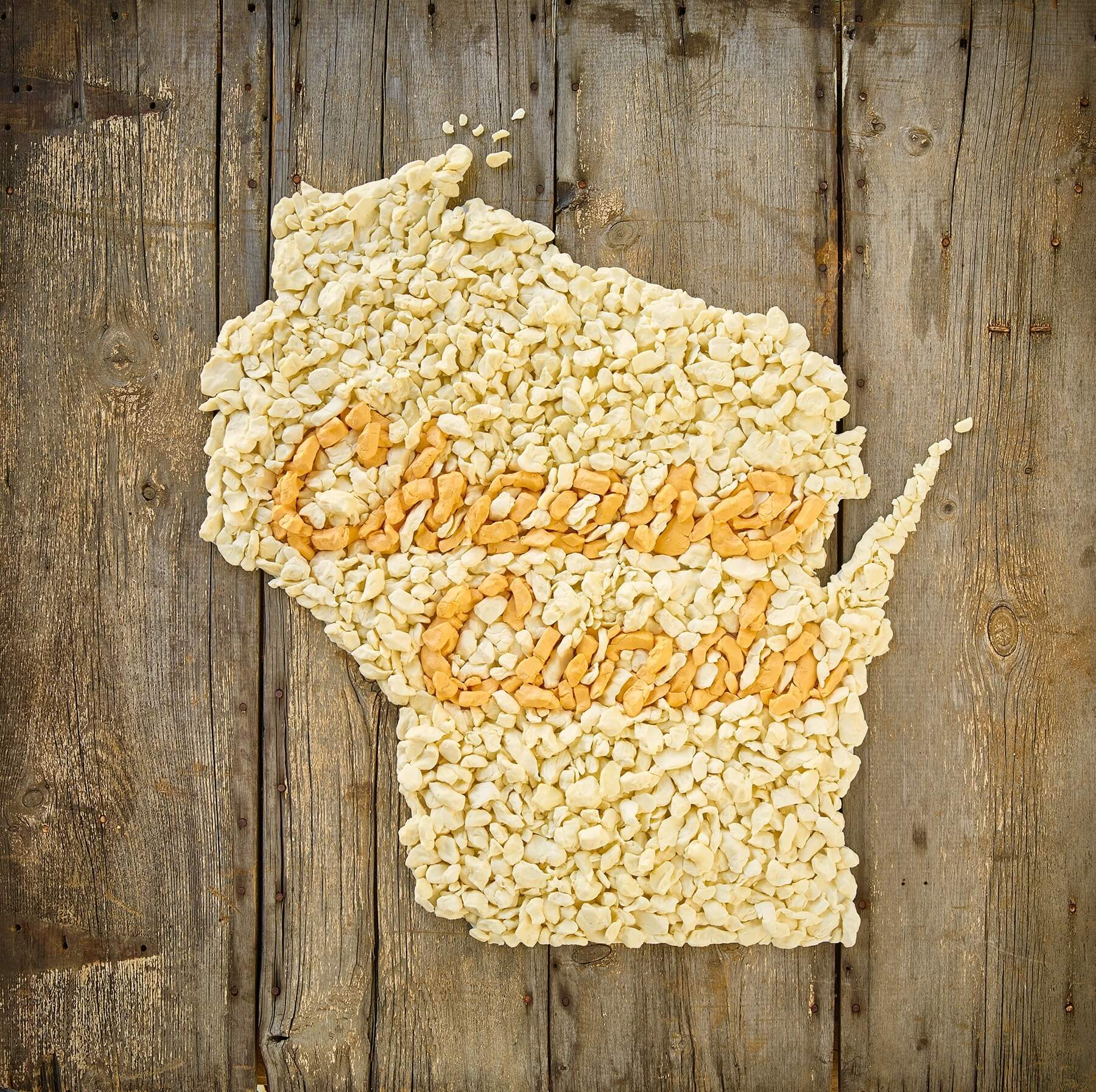 An outline of the state of Wisconsin made from cheese curds