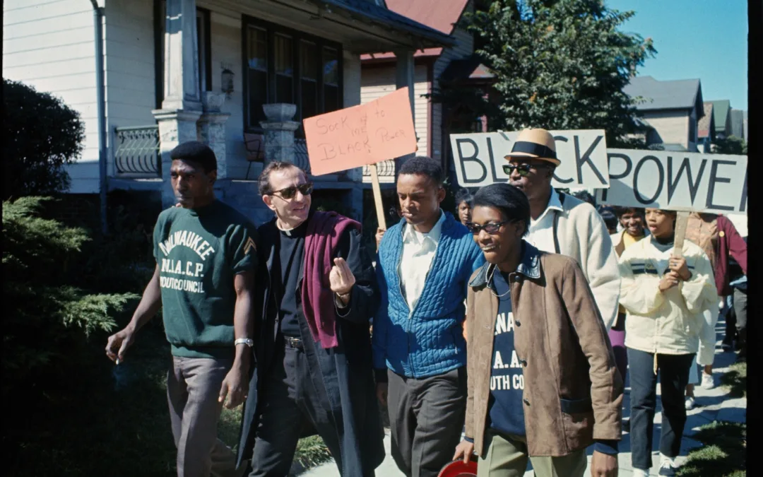 In this photo from Sept. 1, 1967, Father James Groppi leads an open housing demonstration in Milwaukee.