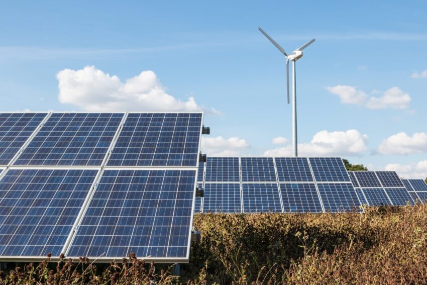 Renewable American Energy - Photo of solar panels and wind turbines