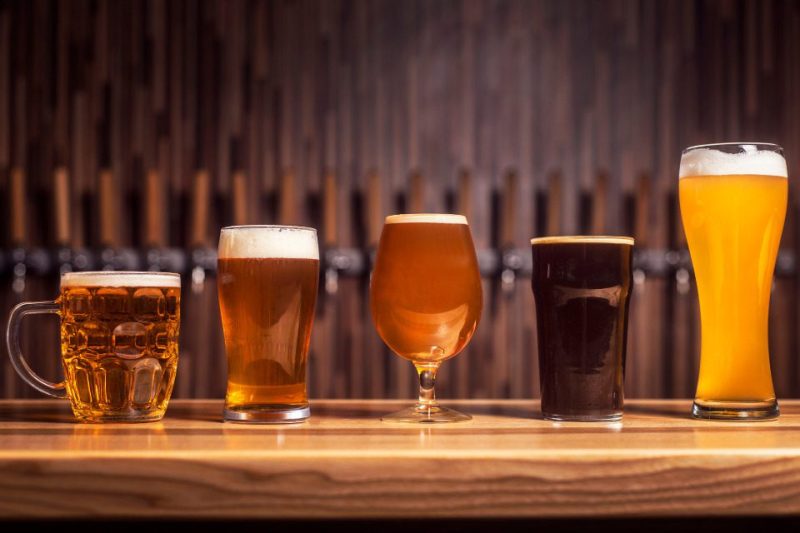 A selection of different craft beers in their signature glassware, as found in local breweries