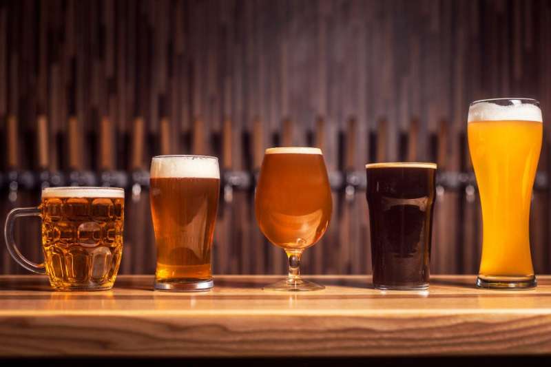 A selection of different craft beers in their signature glassware, as found in local breweries