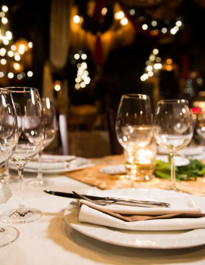 A restaurant table set with fancy glassware.