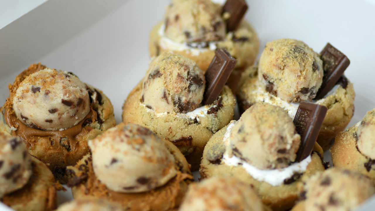 Miggy’s signature cookie cups: ganache-filled chocolate chip cookies, topped with a scoop of edible dough and a mini candy bar.