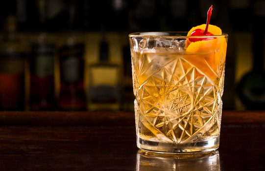 An Old Fashioned in a fancy retro glass