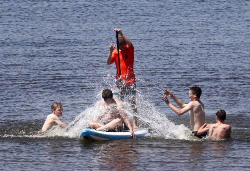 people having fun splashing in the water