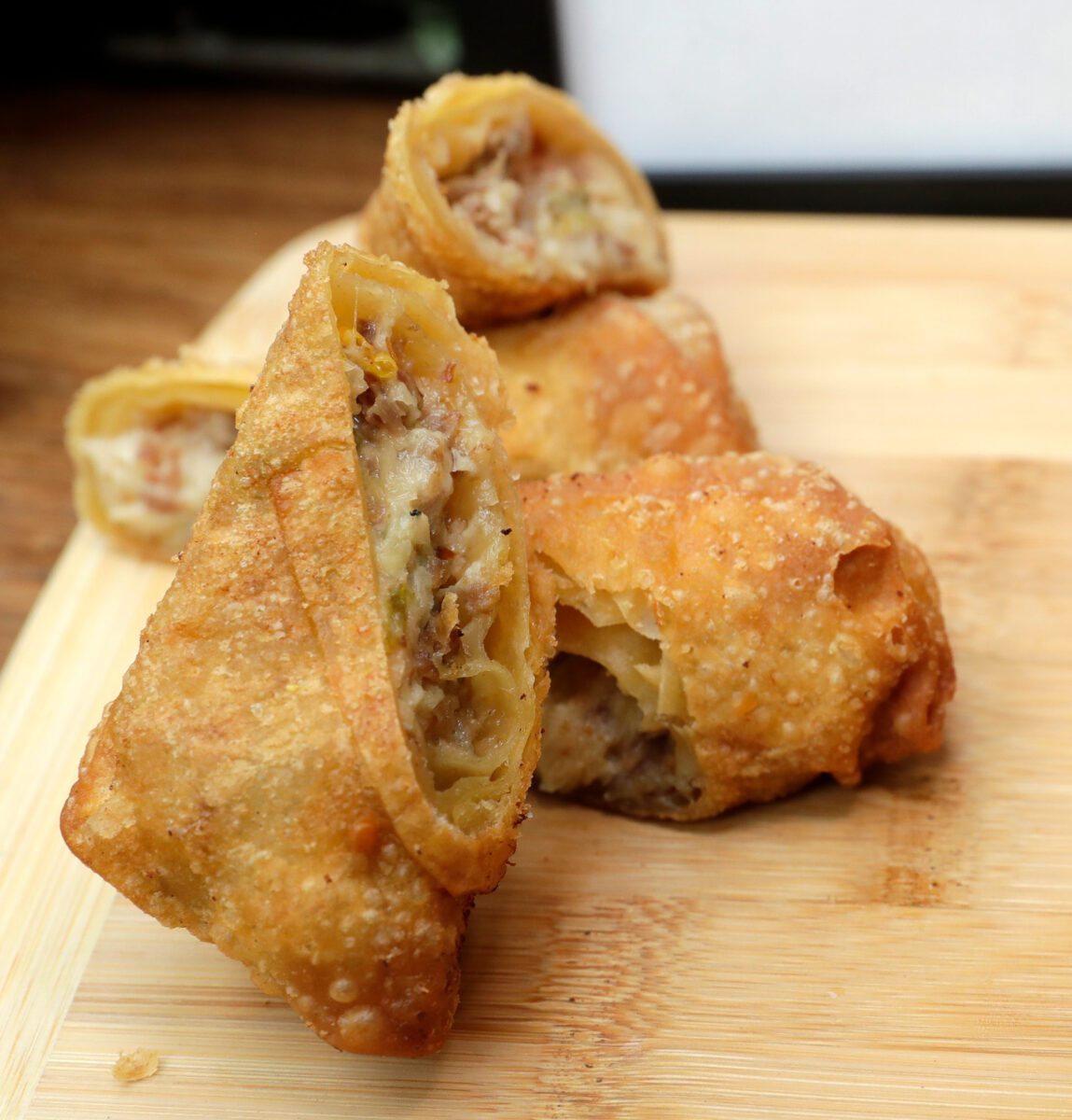 naturally, brat eggrolls contain cheese curds