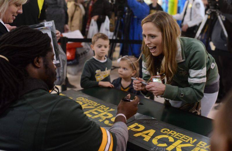 Green Bay Packers signing autographs.