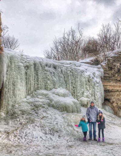 When snowfall covers the Badger State in a glittering blanket of white, the time has come to trek to one of Wisconsin’s dozens of waterfalls for a wintertime escapade.
