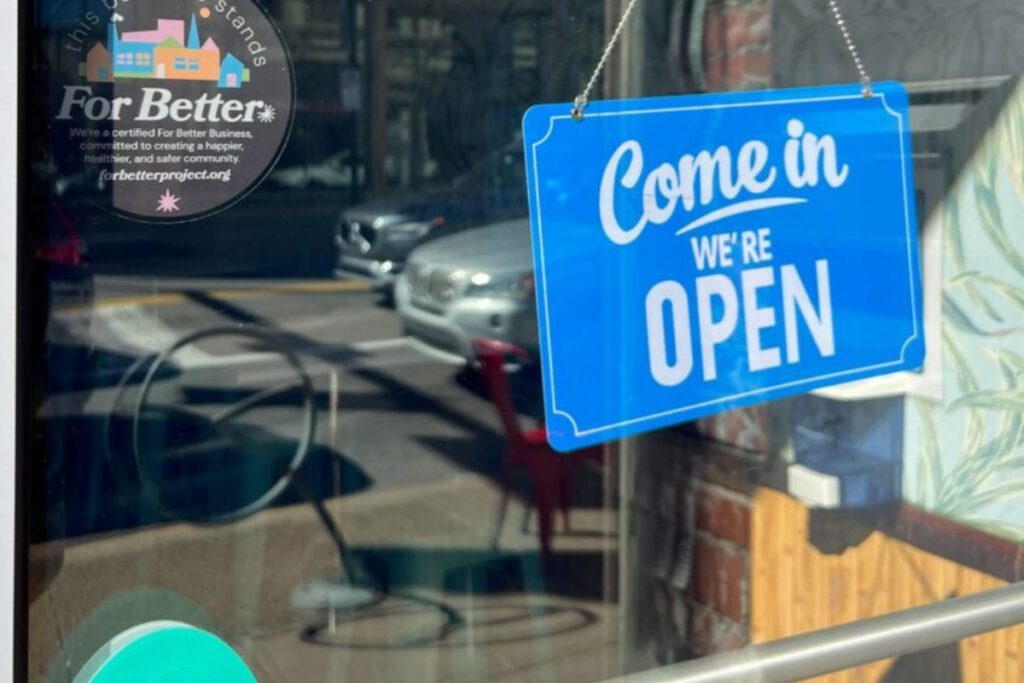 Small business open sign MIssy Hughes economy plan