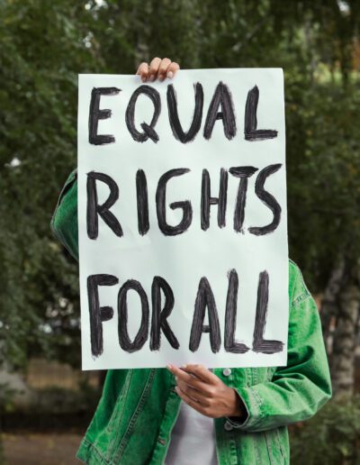 Protests Activist Holding a Placard with Equal Rights for All Text