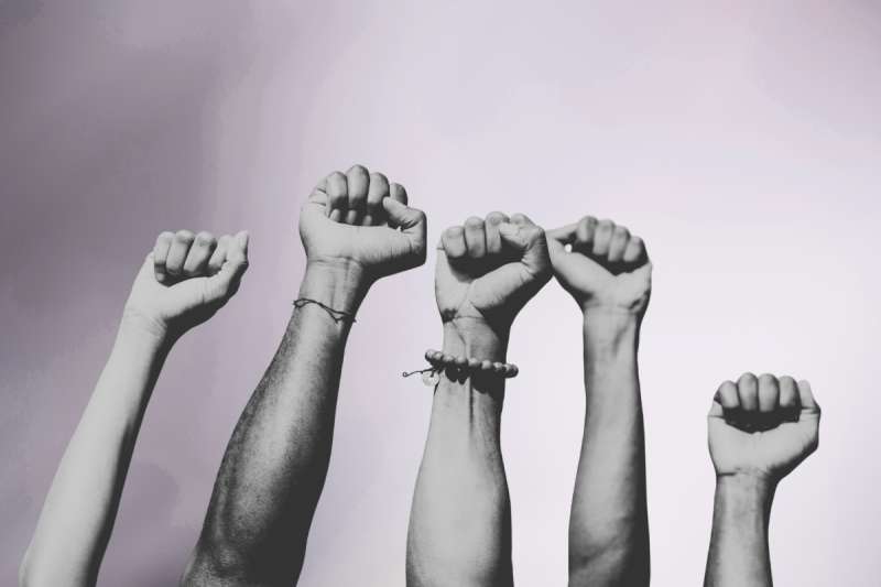 Protests, fists in air