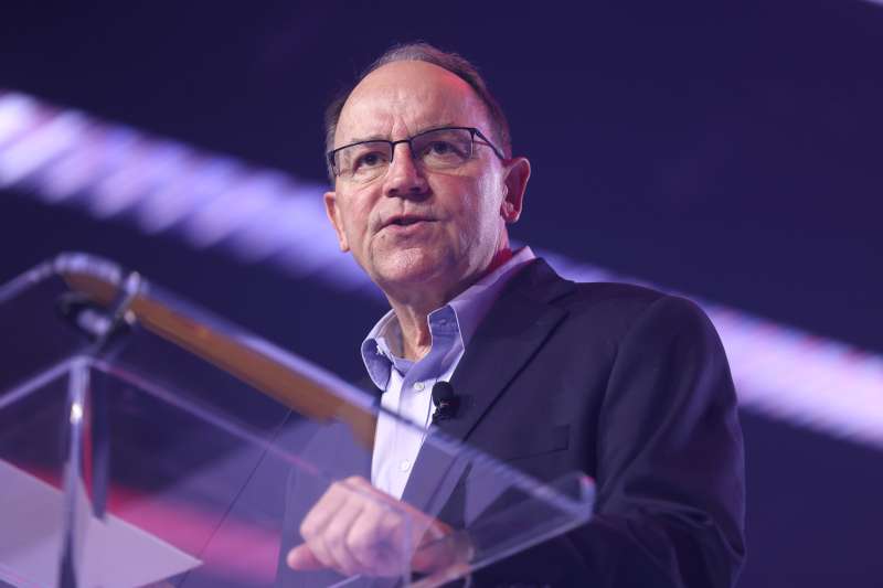 Photo of Rep. Tom Tiffany speaking behind a podium at an event.