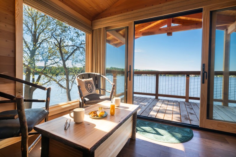 A beautiful lake view from a treehouse-style room on a lake near Wisconsin Dells