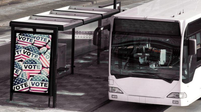 Rides to the polls. Bus at bus stop. Voting sign. franckreporter, ollo via Getty Images Signature
